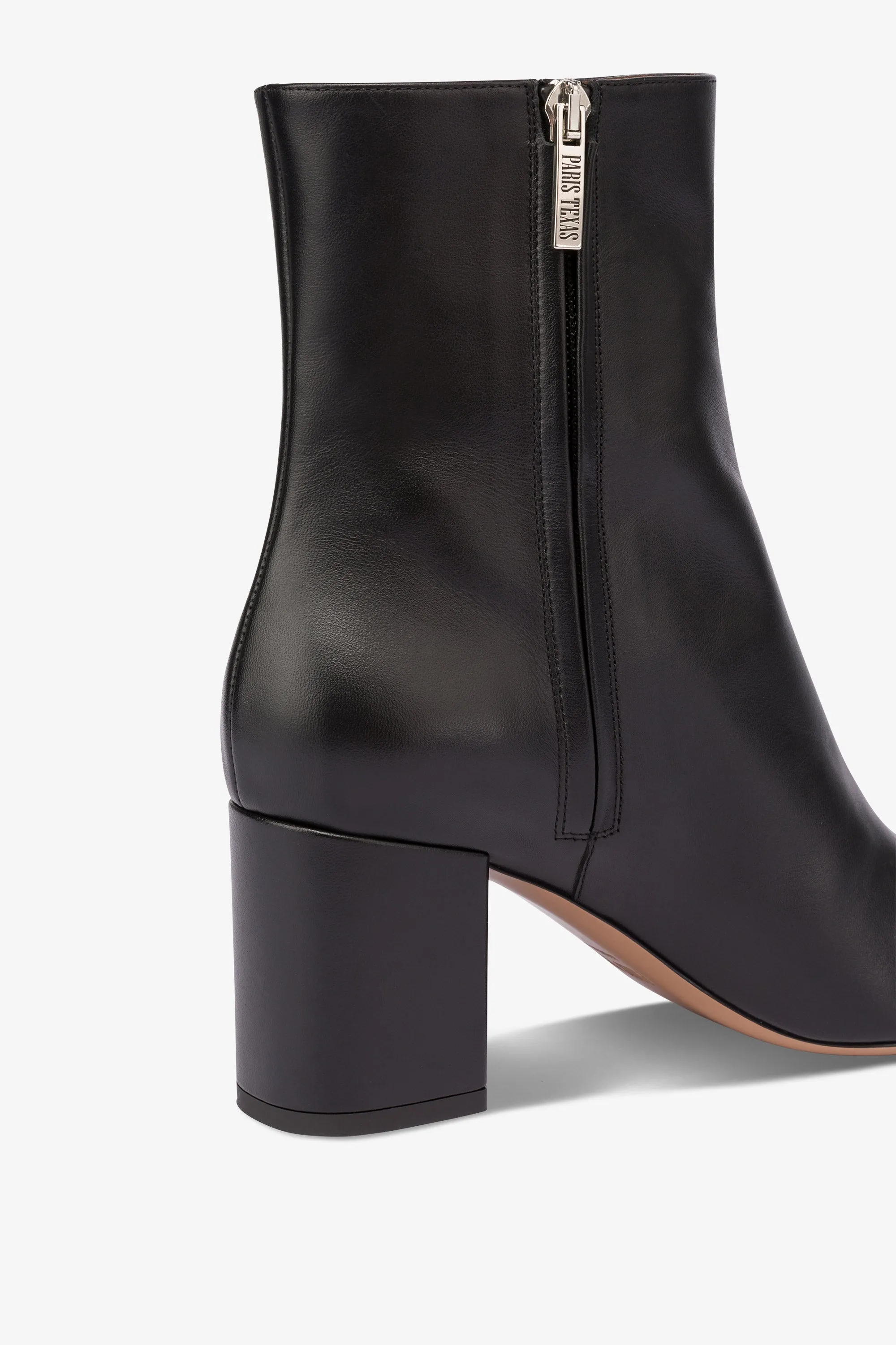 Pointed ankle boots in smooth black leather